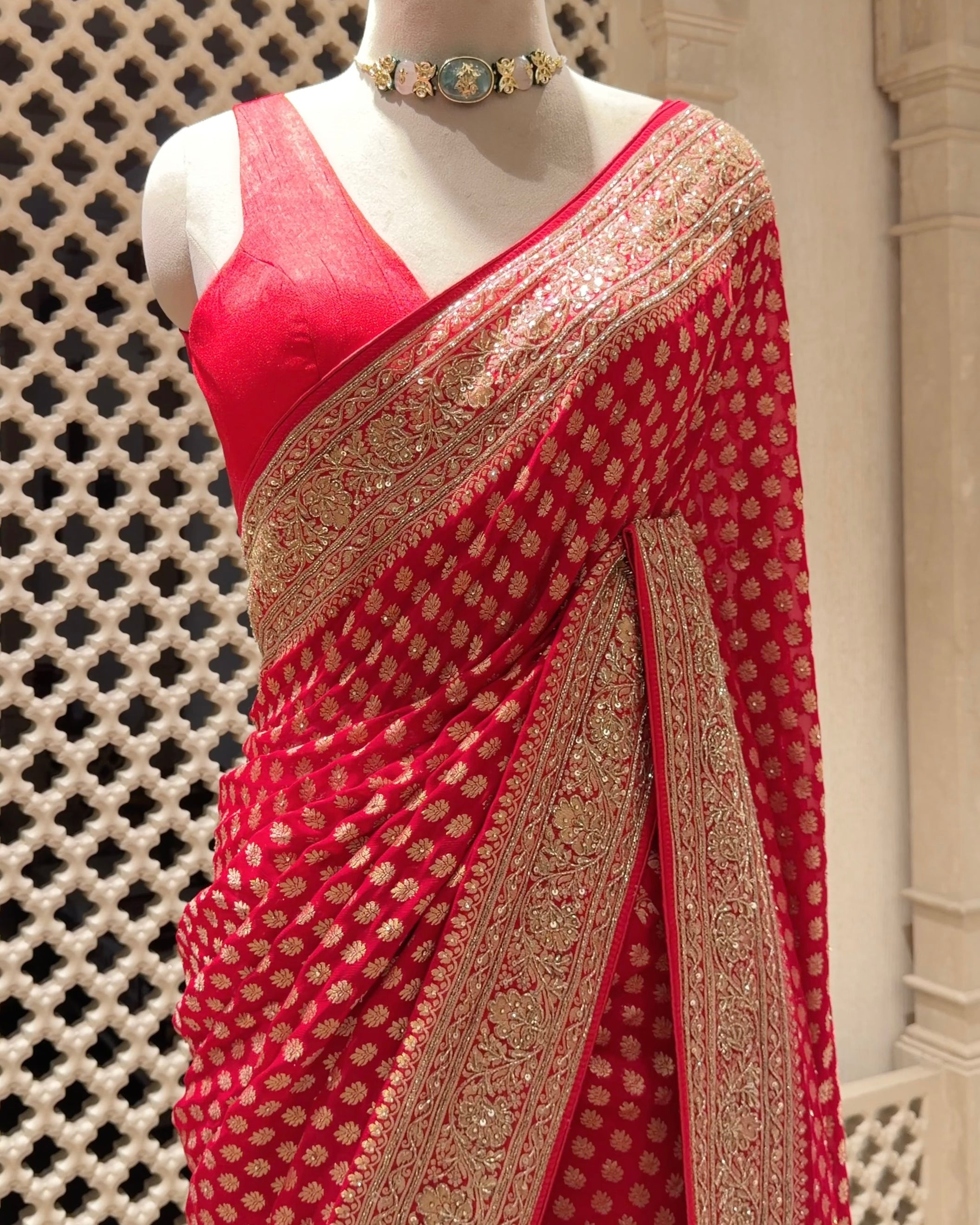 Timeless Red Khaddi Georgette Saree with Gold Buti & Cutdana Sequin Border