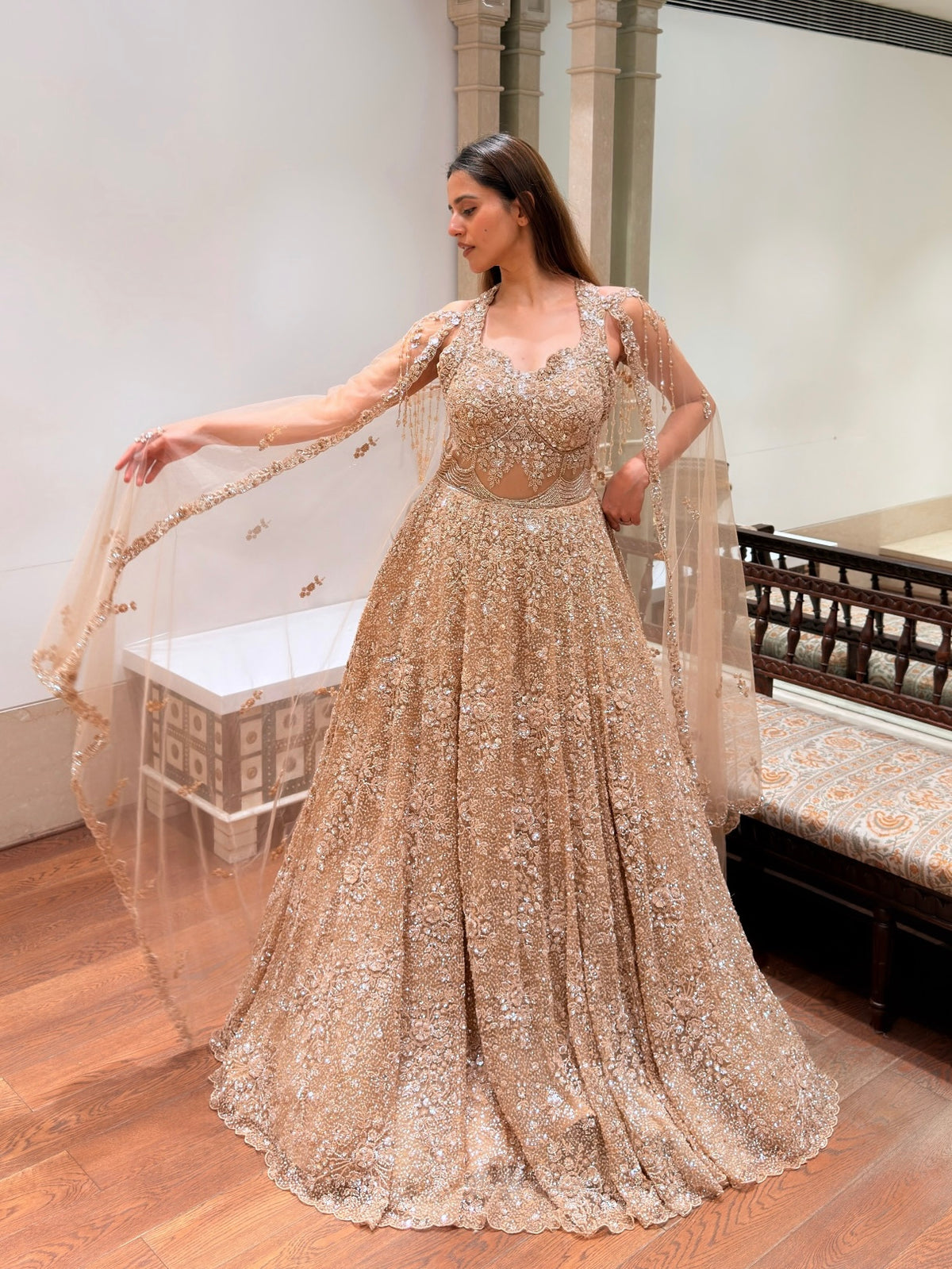 Champagne Gold Net Corset Gown with Cape Sleeves & Cutdana Sippy Work
