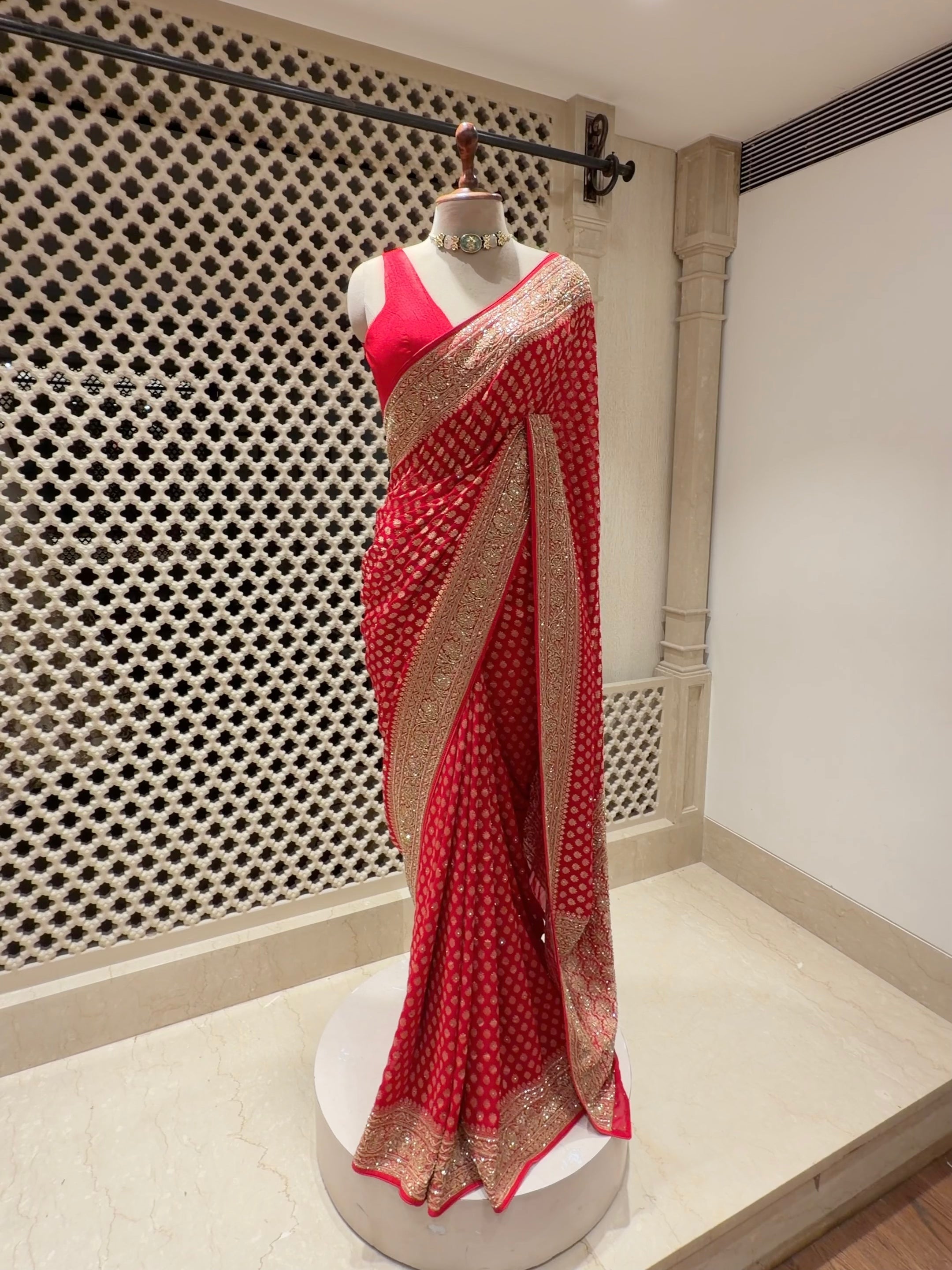 Timeless Red Khaddi Georgette Saree with Gold Buti & Cutdana Sequin Border