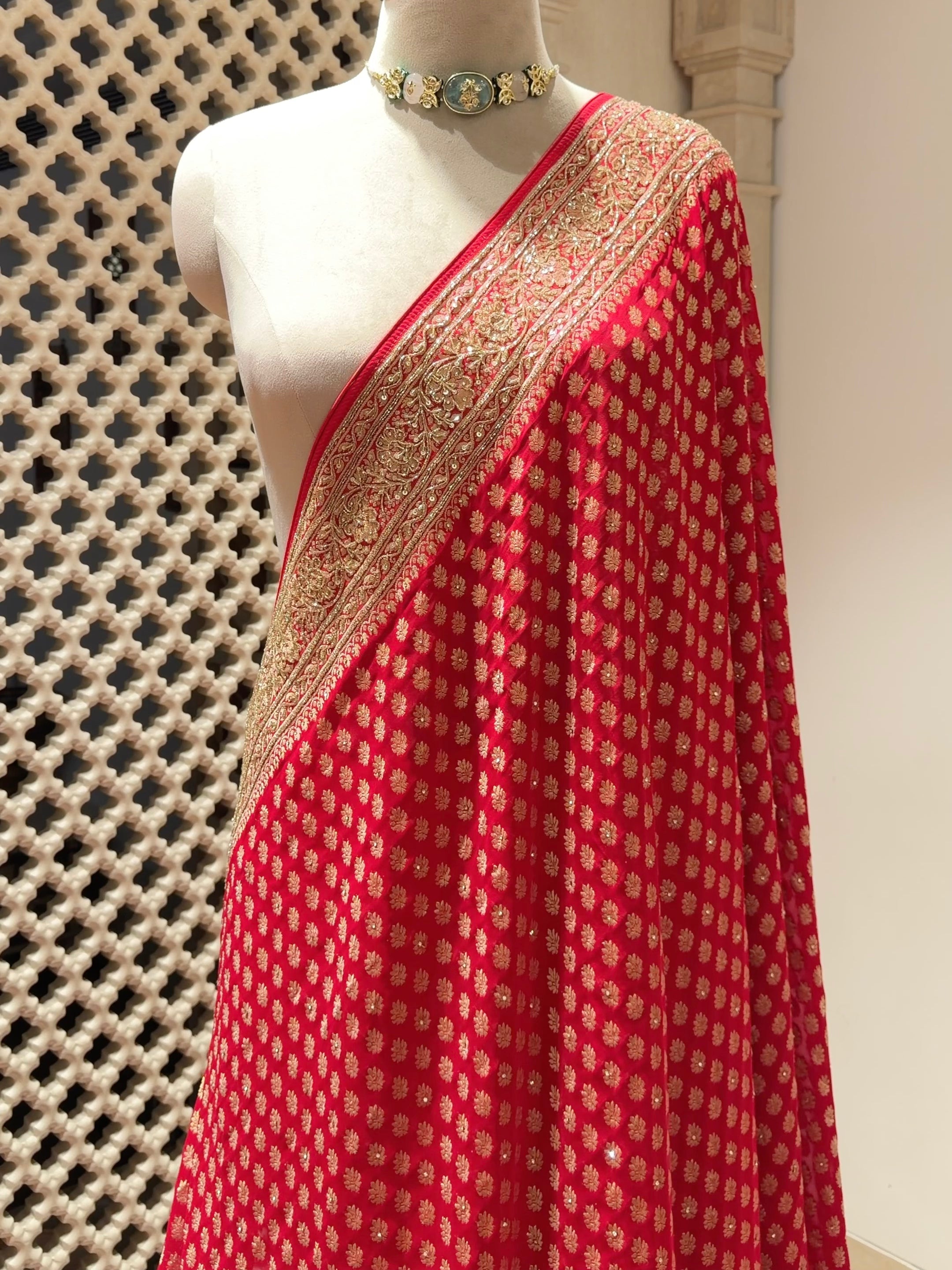 Timeless Red Khaddi Georgette Saree with Gold Buti & Cutdana Sequin Border