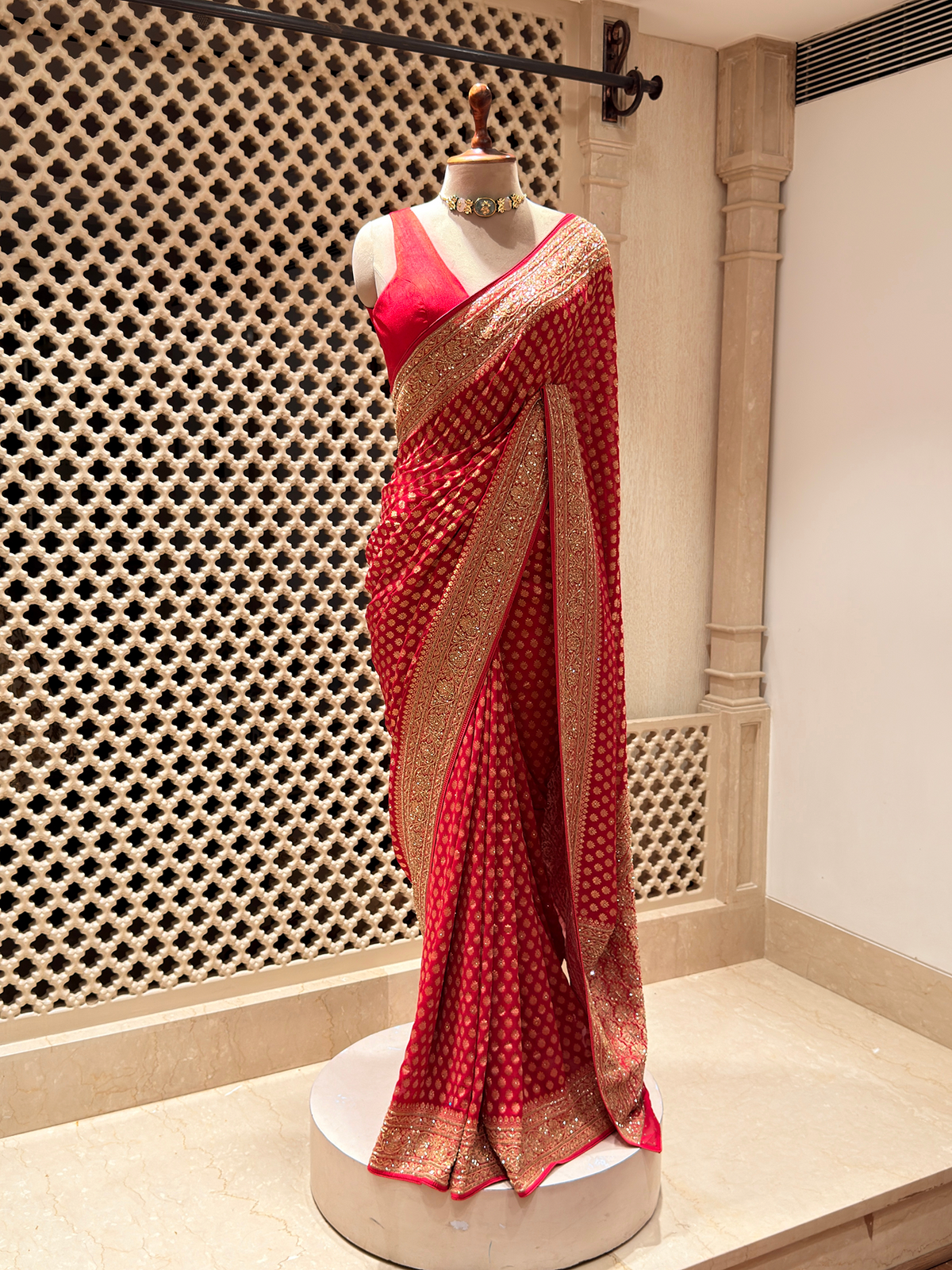 Timeless Red Khaddi Georgette Saree with Gold Buti & Cutdana Sequin Border - Unstitched Blouse